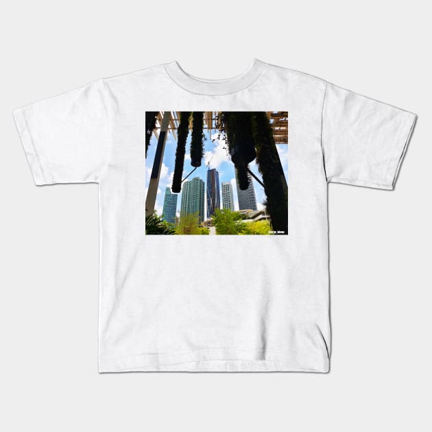 gardens in miami city the landscape of buildings Kids T-Shirt by jorge_lebeau